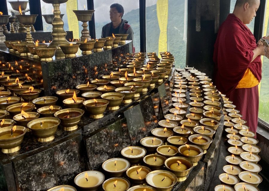 Offering butter lamp in Bhutan